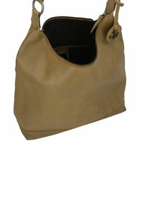 Borsa a mano in pelle beige con forma curva, chiusura a zip e un accento argento sulla tracolla. Interno foderato in tessuto nero.