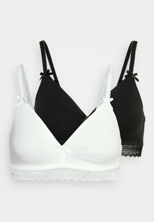 Zwei Bralette, eines in Weiß und eines in Schwarz. Beide haben eine dreieckige Form, weichen Stoff, Spitzenverzierung am unteren Rand und dekorative Schleifen an den Trägern.