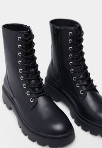 Springfield Stivaletti con plateau - black