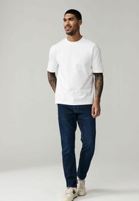 Next MOTION FLEX - Slimfit džínsy - blue dark