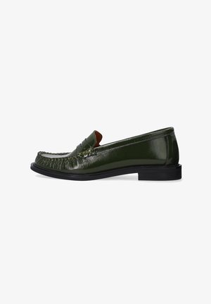 Green patent leather loafers with a stitched fringe detail, flat black rubber sole, and an almond-shaped toe design.