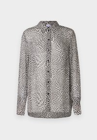Sheer black and white blouse featuring a button-up front, long sleeves, and an abstract pattern with varying textures.