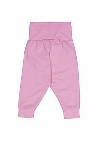 Růžové bavlněné kalhoty pro miminka s elastickým pasem, zúženými nohavicemi a nahrnutými manžetami. Hladká textura, jednoduchý design bez vzorů.
