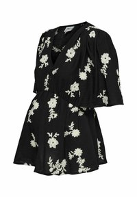 Blouse noire avec broderie florale blanche, col en V, boutonnage devant et manches courtes larges, avec taille froncée et coupe ample.