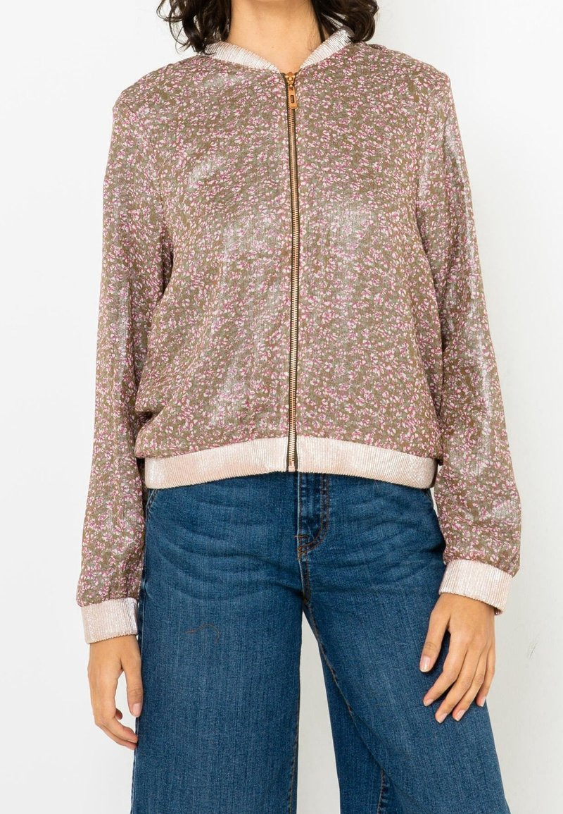 Floral bomber jacket with a green and pink pattern, metallic sheen, zip closure, and ribbed cuffs. Fabric is lightweight with a textured finish.
