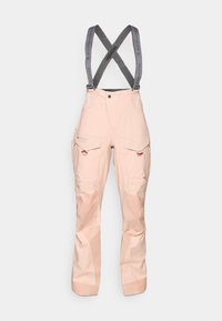 Calças de ski impermeáveis em rosa claro com suspensórios cinzentos ajustáveis, múltiplos bolsos e um design de corte largo para mobilidade.