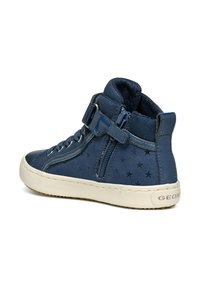 Zapatillas altas azules con estampado de estrellas, que cuentan con un cierre de cremallera y una correa de velcro. Fabricadas con materiales texturizados y suela de goma.