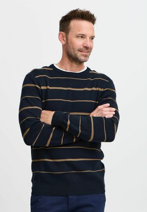 Navy striped sweater with horizontal gold and white stripes, featuring a crew neckline and ribbed cuffs. Made from a soft knit material.