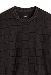 Dark brown crew neck sweater with a textured square pattern, made from soft fabric. Ribbed neckline and subtle branding on the inner tag.