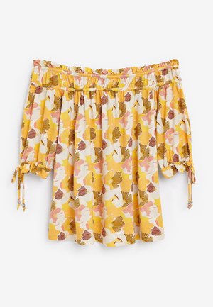Blouse épaules dénudées avec motif floral jaune, rose, blanc et marron, encolure élastique et manches 3/4 avec liens ajustables.