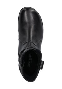 Bottine en cuir noir avec un bout arrondi, des détails de couture subtils, une fermeture zippée sur le côté et une petite languette à l'arrière pour un enfilage facile.