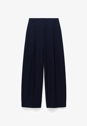 Granatowe spodnie o szerokich nogawkach z wysokim stanem, przednimi plisami i gładką fakturą materiału. Posiadają szlufki na pasek oraz czystą, dopasowaną sylwetkę.