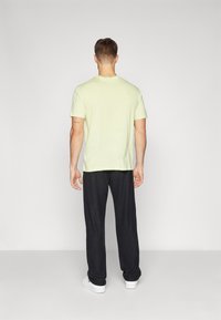Champion ICONS STRAIGHT PANTS QUICK DRY - Tepláky - black