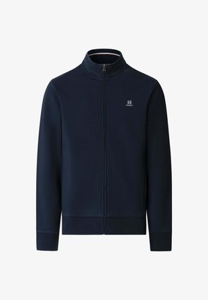 Námornícka modrá bunda na zips s vysokým golierom a malým bielym logom Hackett na ľavej strane hrudníka, dlhé rukávy, rebrované manžety a lem.