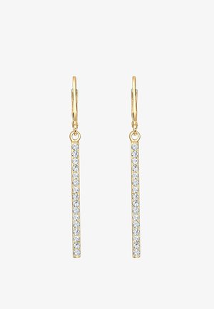 Boucles d'oreilles pendantes en ton doré, présentant un design en barre droite, ornées d'une rangée de cristaux transparents sur toute la longueur. Clips pour un maintien sécurisé.