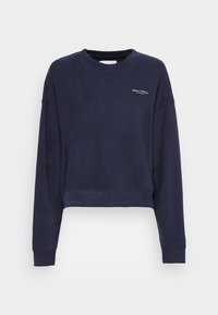 Sudadera corta navy de tejido suave, con mangas largas, cuello redondo y un pequeño logotipo en la parte izquierda del pecho.