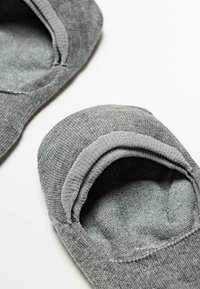 Gray ankle socks made of soft fabric, featuring a low-cut design, ribbed edging, and a smooth texture with no visible patterns.