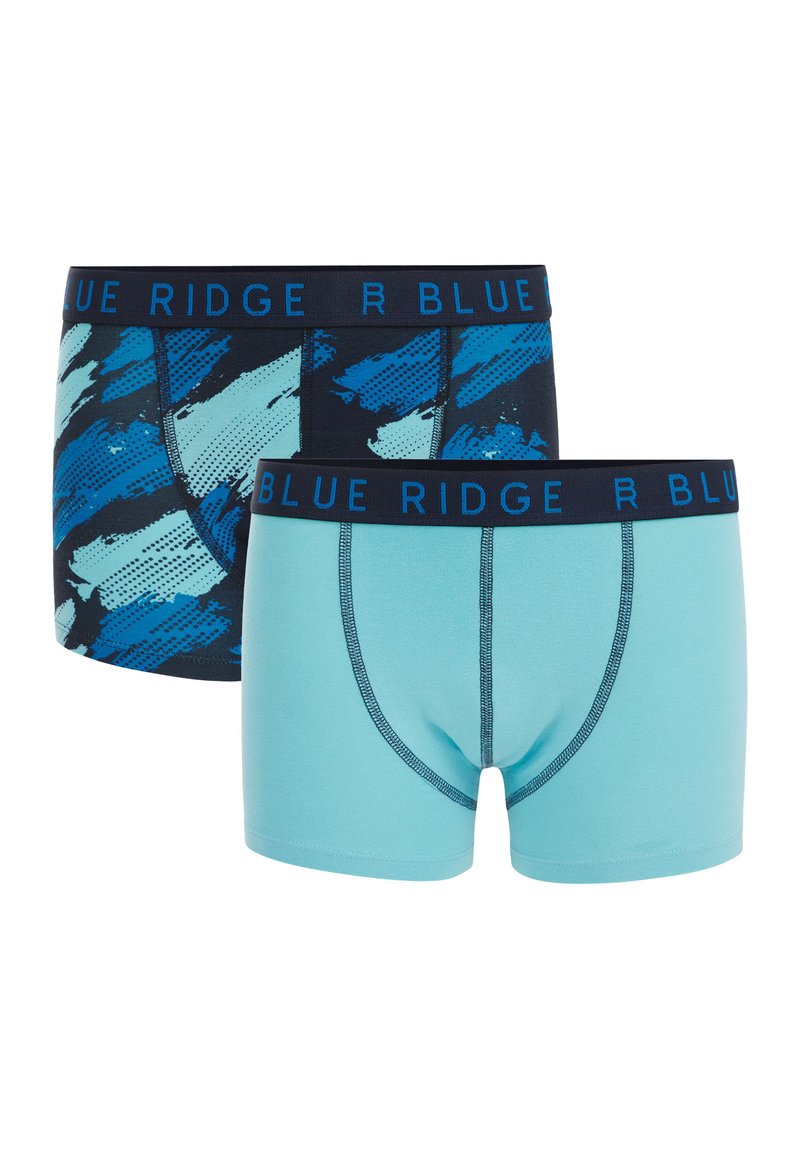 Dve pare fantovskih boksaric; ene so v enotni teal barvi z mornarskimi šivi, druge pa imajo modri abstraktni vzorec na mornarskem ozadju.