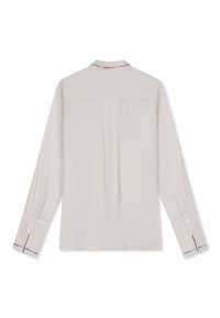 Langsleeve blouse van lichtbeige katoen, met een kleurrijke geborduurde kraag, een rugplooing en knoopmanchetten.