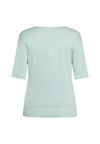Top corto a maniche corte di un leggero verde menta, realizzato in un materiale morbido, con scollatura a girocollo e dettagli a costine all'orlo. Tessuto liscio, design semplice.
