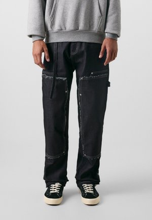KAJAL UNISEX - Bő szabású farmernadrág - raw denim dark blue