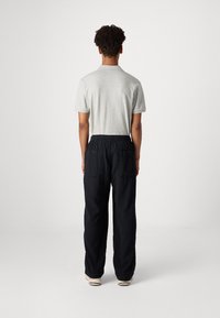 Abercrombie & Fitch BAGGY - Kalhoty - casual black