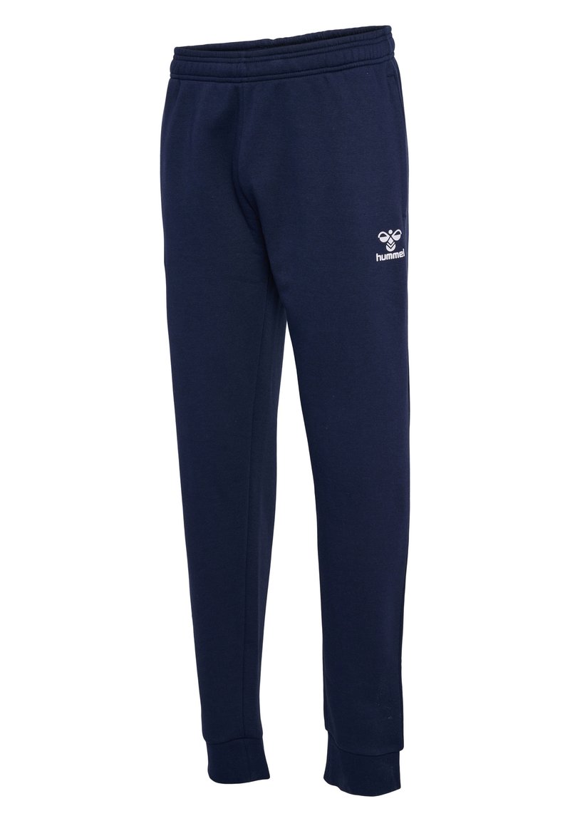 Navyblaue Jogginghosen aus weichem Material, mit einem elastischen Bund und gerippten Bündchen; enthält ein weißes Hummel-Logo auf der Vorderseite.