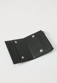 Black leather wallet with multiple card slots, a zippered section, and silver snap buttons. Smooth texture with a sleek design.