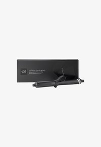 Schwarze Lockenwickler mit 32 mm Barrel, glatter Oberfläche, metallischen Akzenten und integriertem Griff. Begleitet von einer eleganten schwarzen Verpackungsbox.