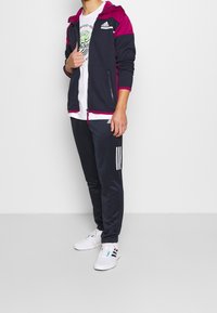 adidas Performance Felpa con zip - dark blue