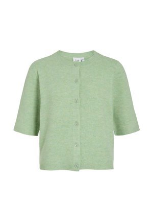 Gaiši zaļa, īsām piedurknēm adīta kardigāns ar apaļu kakla izgriezumu un sešiem priekšējiem pogām, īss garums.