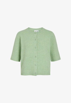 Gaiši zaļa, īsām piedurknēm adīta kardigāns ar apaļu kakla izgriezumu un sešiem priekšējiem pogām, īss garums.