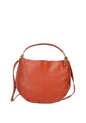 Rust-colored leather shoulder bag with two straps, pebbled texture, slightly rounded base, and small metal charm near the top right side.