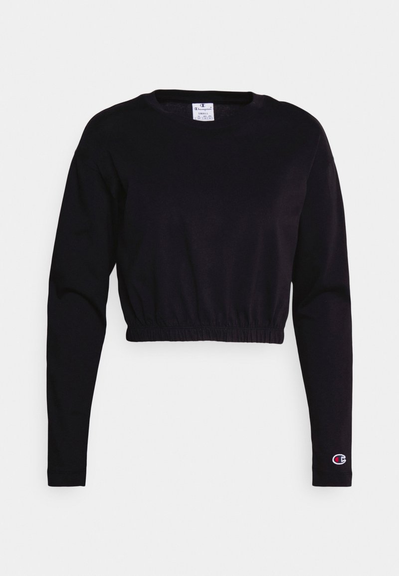 Felpa nera corta con maniche lunghe, orlo elastico e una piccola etichetta con logo sulla manica sinistra. Realizzata in morbido cotone con una texture liscia.