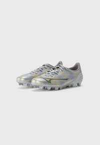 Silver and gold soccer cleats with a textured upper, featuring a streamlined shape, gray accents, and black logo. Six studs for traction.
