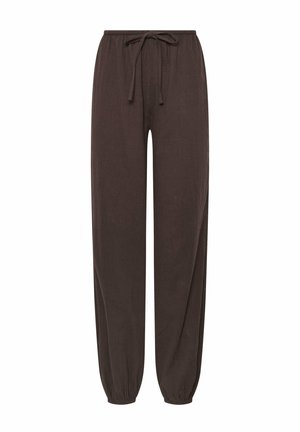 Brune løs pasform bukser med elastisk talje, snøre og elastiske manchetter ved anklerne, vist på hvid baggrund.