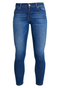 Jeans ajustados azules de mezclilla, con una cintura alta, diseño estándar de cinco bolsillos y un ligero desvanecimiento en las piernas frontales.