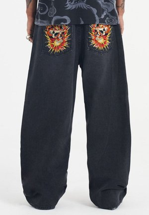 EXPLODING SKULL XXTRA - Flared Jeans - black
