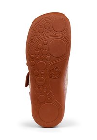 Semelle d'une chaussure marron pour enfant avec des motifs circulaires texturés et un petit visage souriant embossé, taille 28 marquée sur la semelle.