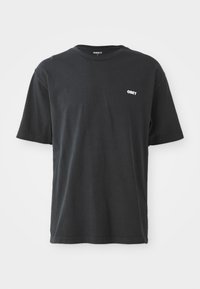 Black short-sleeve T-shirt made of cotton, featuring a crew neckline and a small white "OBEY" logo on the chest area.