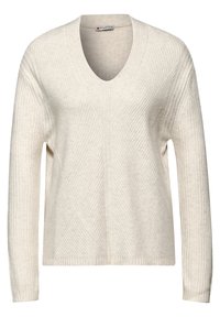 Beige V-Ausschnitt-Pullover aus gerippter Textur, mit langen Ärmeln und lockerem Schnitt, der ein geometrisches Muster zeigt.