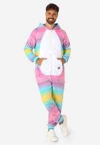 Colorful onesie featuring a gradient of pink, blue, and yellow. Soft fabric with front pockets, zip closure, and a white panel.