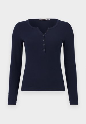 Dunkelblaues langärmeliges Henley-Top mit rundem Ausschnitt, knopfbarem Vorderteil mit fünf Knöpfen, gerippter Textur und figurbetonter Silhouette.
