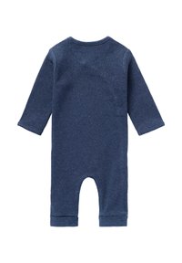 Granatowy kombinezon z długim rękawem, wykonany z prążkowanej tkaniny, z otwartym dołem, dopasowanymi mankietami i okrągłym dekoltem.