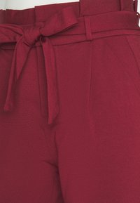 Vero Moda Housut - bordeaux
