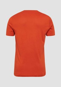 Korte mouw T-shirt in fel oranje, gemaakt van zachte katoen, met een ronde hals en een gladde textuur zonder patronen of accenten.