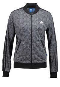 Černá bomber bunda s bílým vzorem ve tvaru vějíře, se zipovým zapínáním a bočními kapsami. Obsahuje žebrové manžety a kulatý límec.