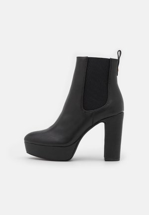 Bottines à talons hauts - black