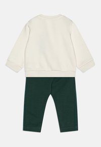 adidas Originals CREW INFANT UNISEX SET - Legingi — bikses - cloud white/mineral green