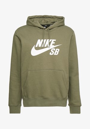 Oliwkowo-zielona bluza z kapturem Nike SB z przednią kieszenią kangurką, regulowanym sznurkiem w kapturze oraz białym logo Nike i znakiem Swoosh na piersi.